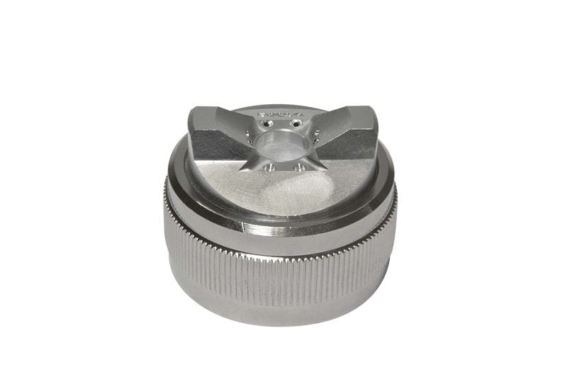 Air caps and nozzle sets for spray guns